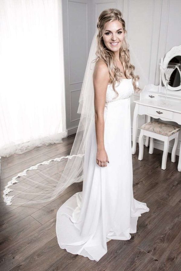 Bride wearing veil with half up half down hair