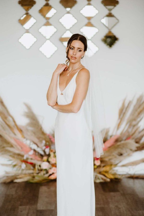 Lauren – single layer fingertip length veil with a pencil edge