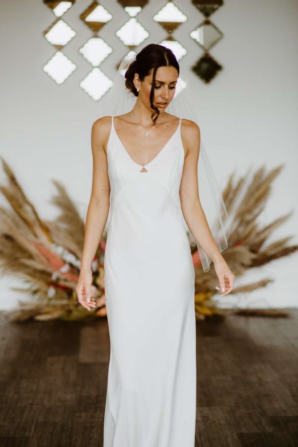 Lauren – single layer fingertip length veil with a pencil edge