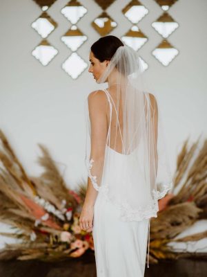 Alana - single layer hip length veil with silver & ivory lace & a hand beaded edge