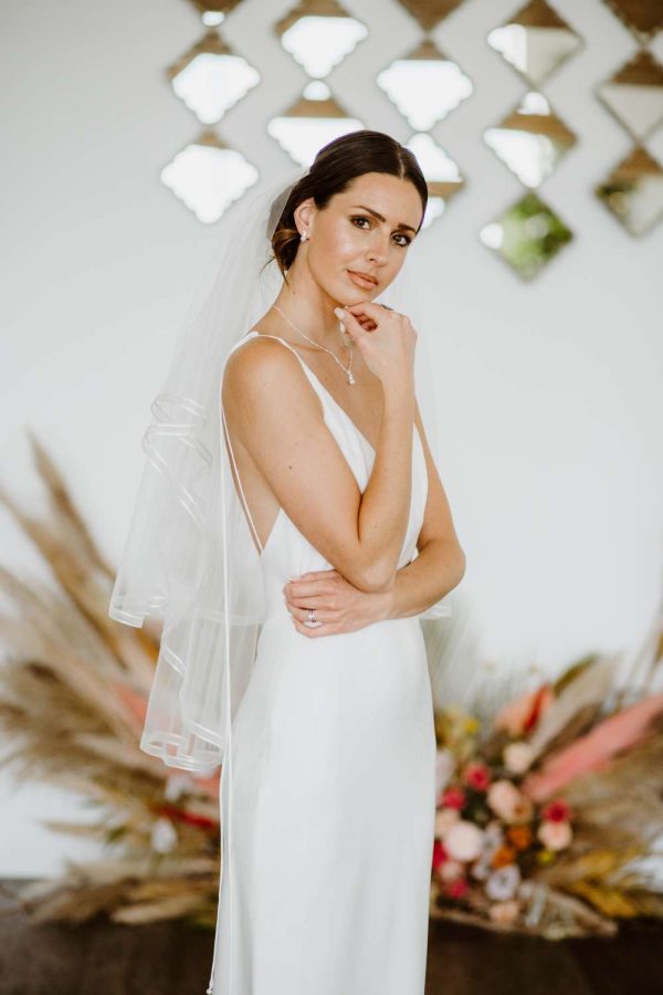 Candice - two tier hip length veil with a satin & organza ribbon edge