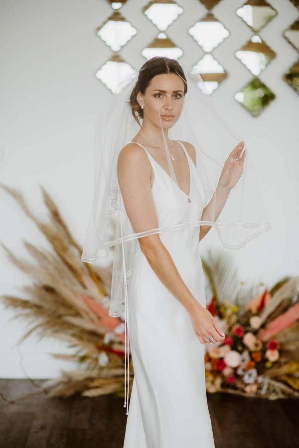 Candice - two tier hip length veil with a satin & organza ribbon edge
