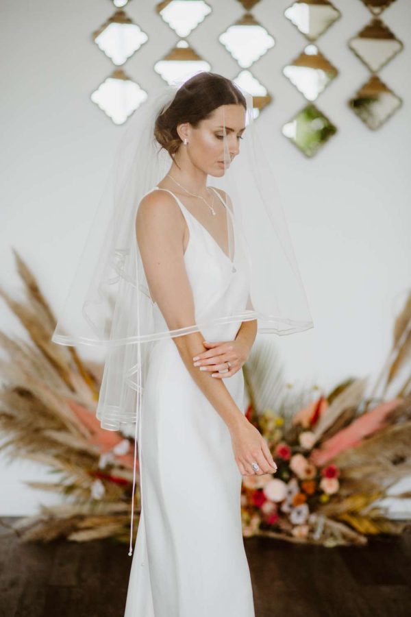 Candice - two tier hip length veil with a satin & organza ribbon edge