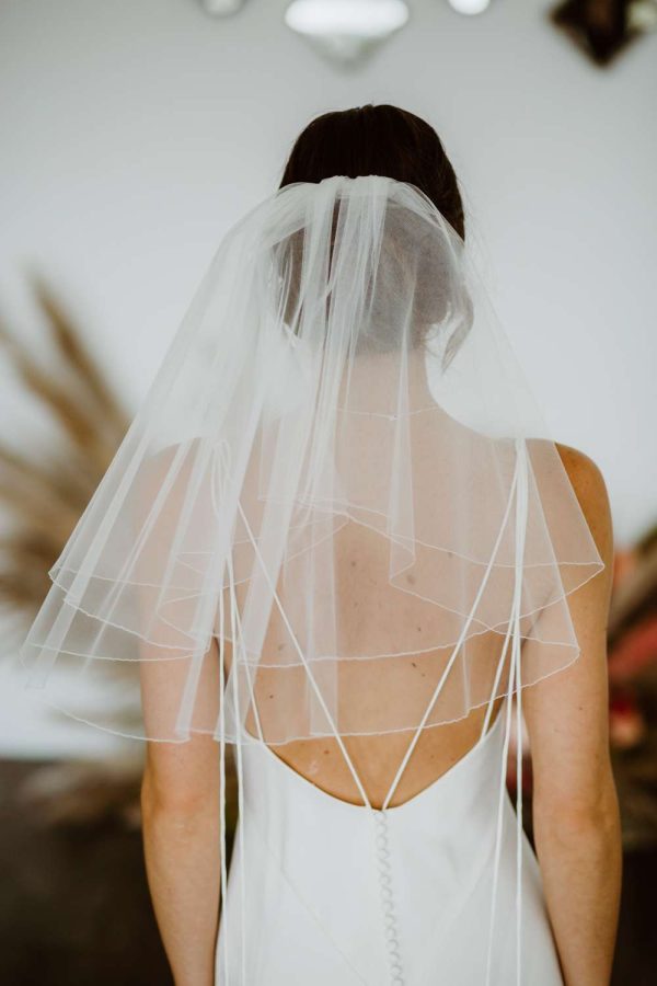 Charlie – two layer shoulder length wedding veil with a pencil edge