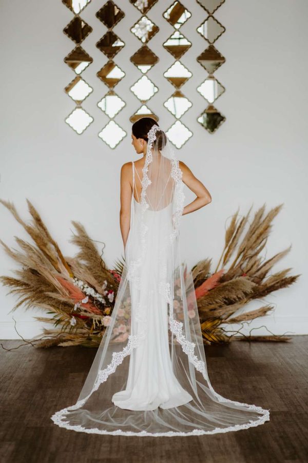 Harmony – single layer chapel length lace edged mantilla veil with comb
