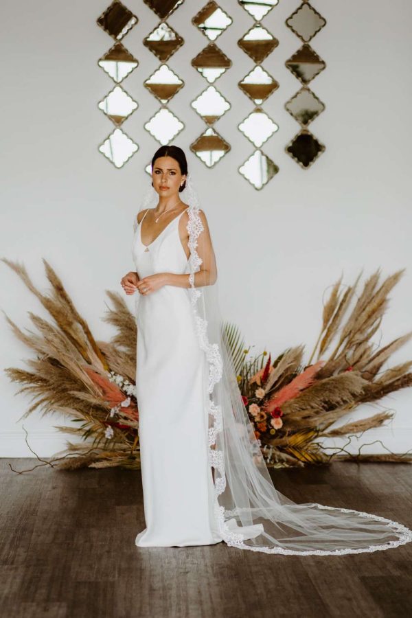 Harmony – single layer chapel length lace edged mantilla veil with comb