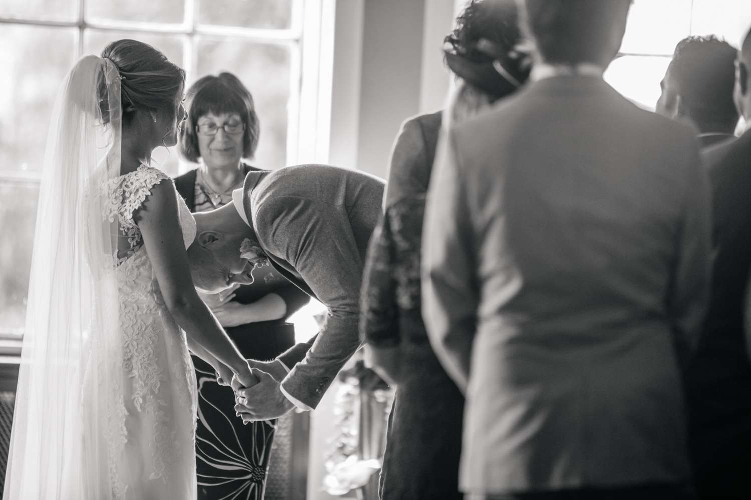 Real bride wearing long chapel length wedding veil Brooke