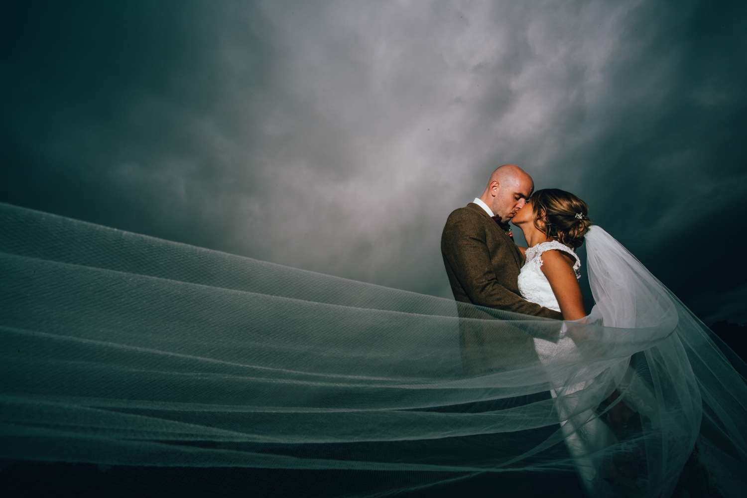 Real bride wearing long chapel length wedding veil Brooke
