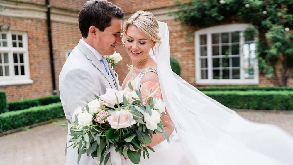 ivory crystal edged veil on real bride Roh