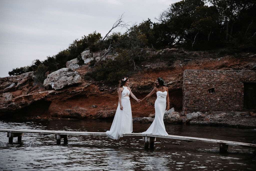 two brides in wedding dresses
