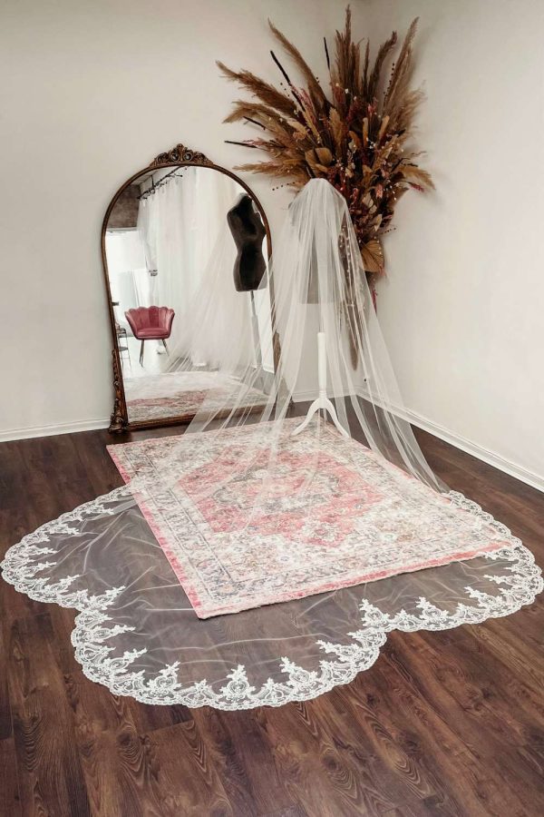 Bespoke lace veil with shaped train