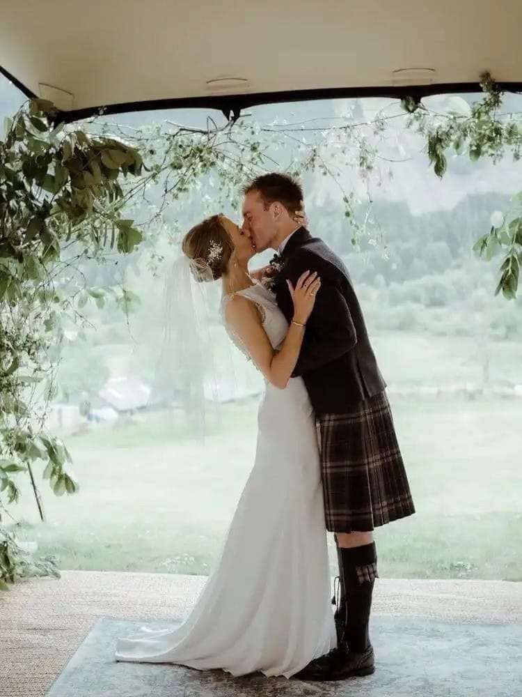 Real bride in waist length veil