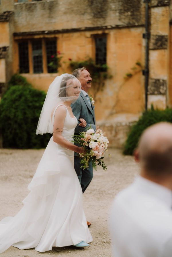Real Bride Nicole in a short ivory veil in elbow length veil Priscilla