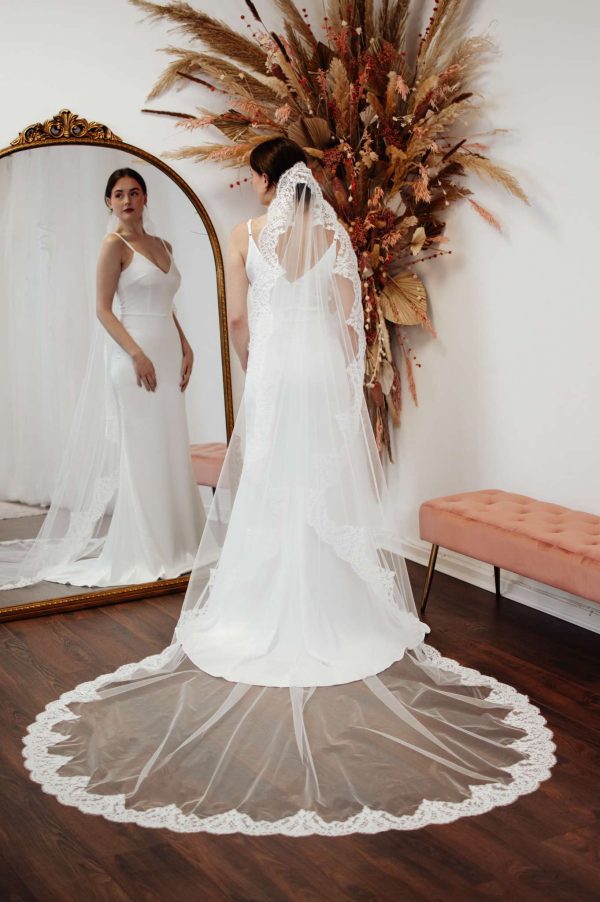 Adeline – Cathedral Length Mantilla Veil With French Lace floor