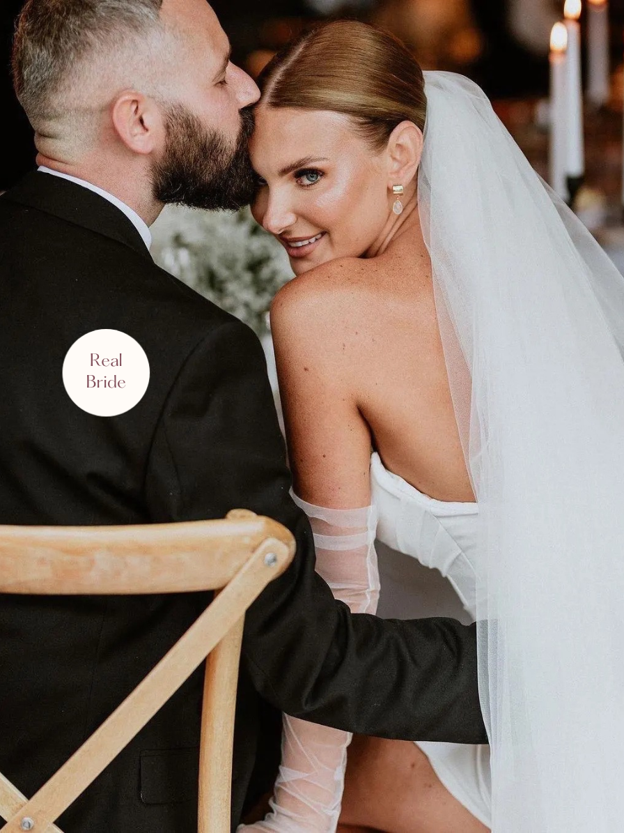 Anastasia – Classic Two Tier Cathedral Veil with a Cut Edge 7 Real bride wearing Anastasia