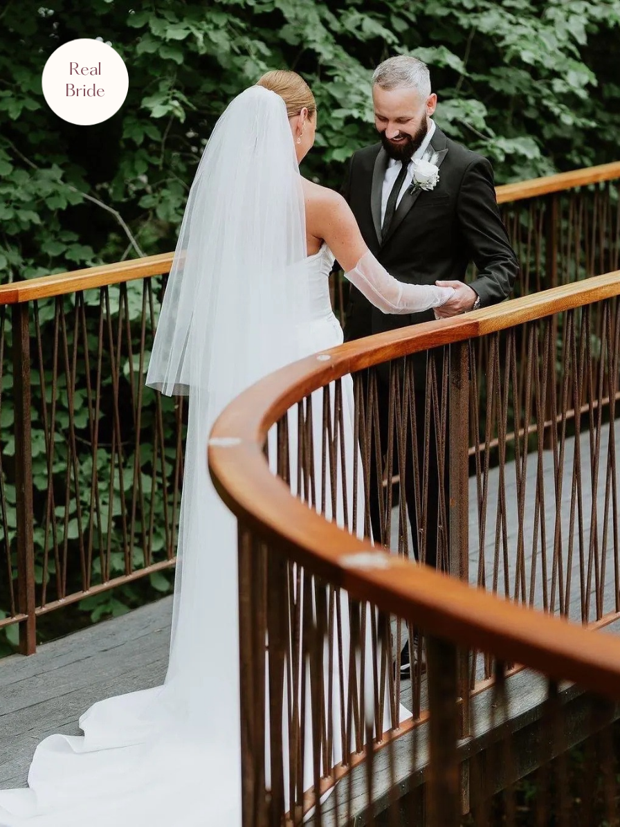 Anastasia – Classic Two Tier Cathedral Veil with a Cut Edge 11 Real bride wearing Anastasia