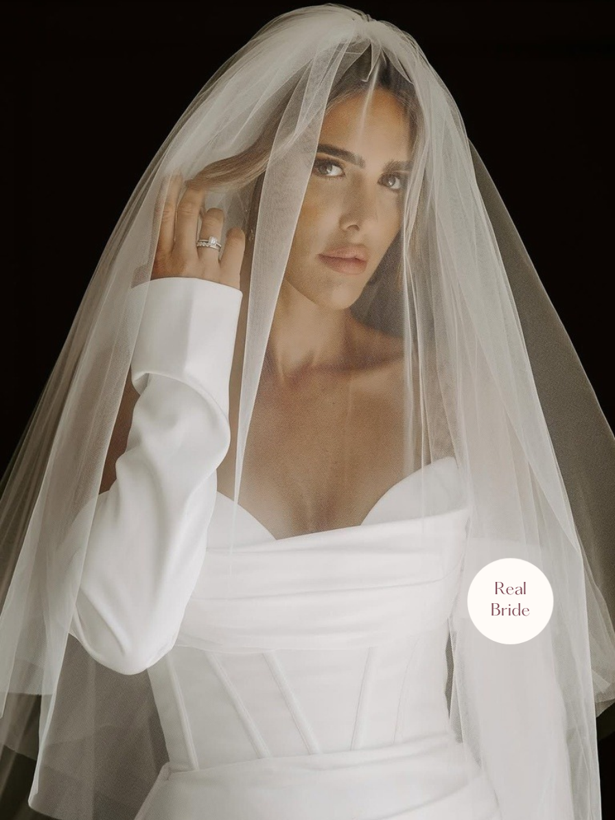 Anastasia – Classic Two Tier Cathedral Veil with a Cut Edge 15 Real bride wearing Anastasia